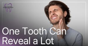 man holding jaw in pain